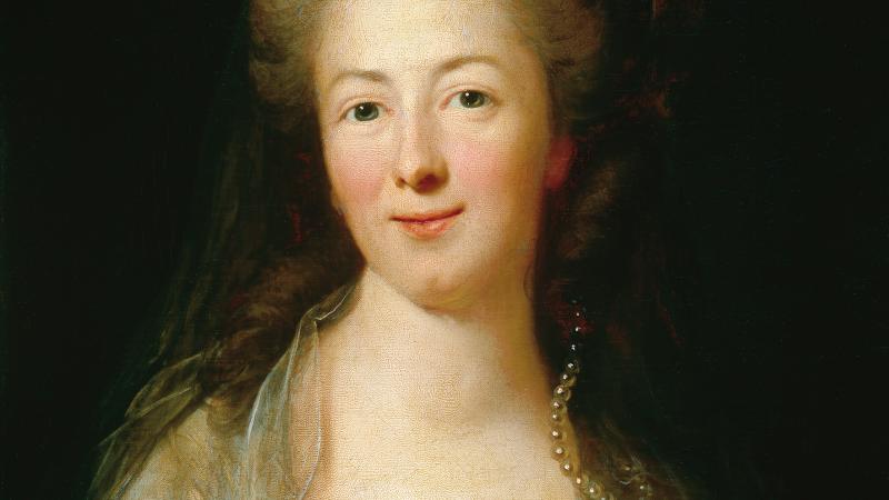 Portrait of a woman with brownish-gold hair and a dress of roughly the same color.
