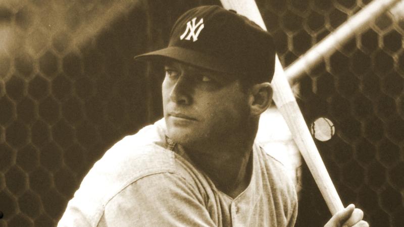 Mantle at bat, ready to swing, wearing a New York Yankees cap
