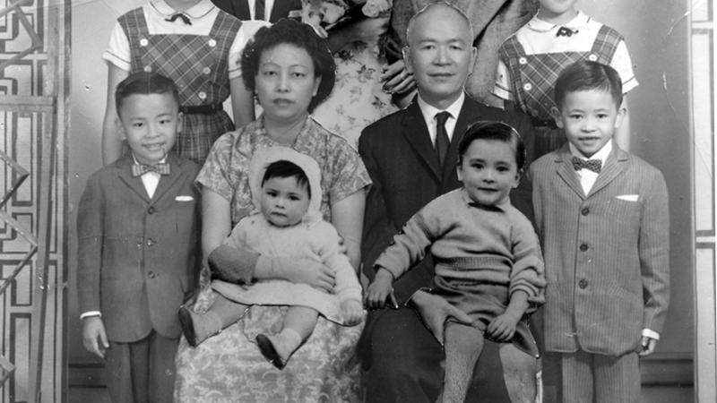 Black and white photo portrait of a Chinese family.