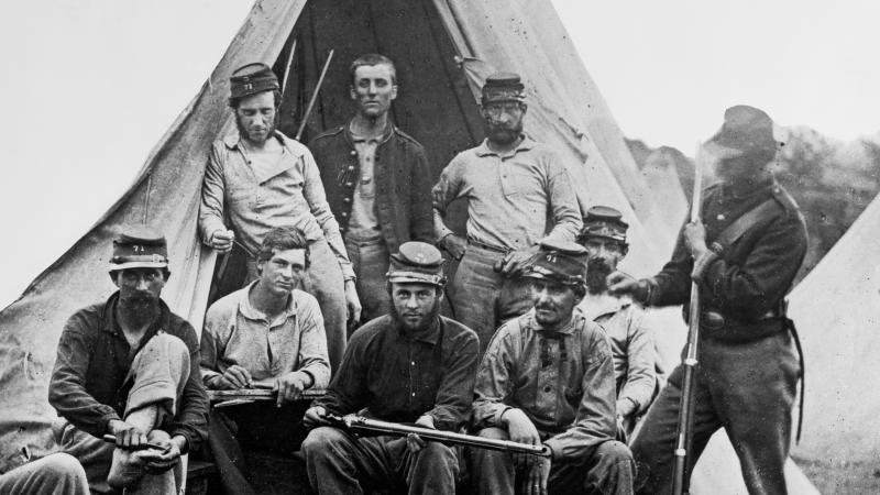 Black and white image of Union soldiers assembled for a group photo.