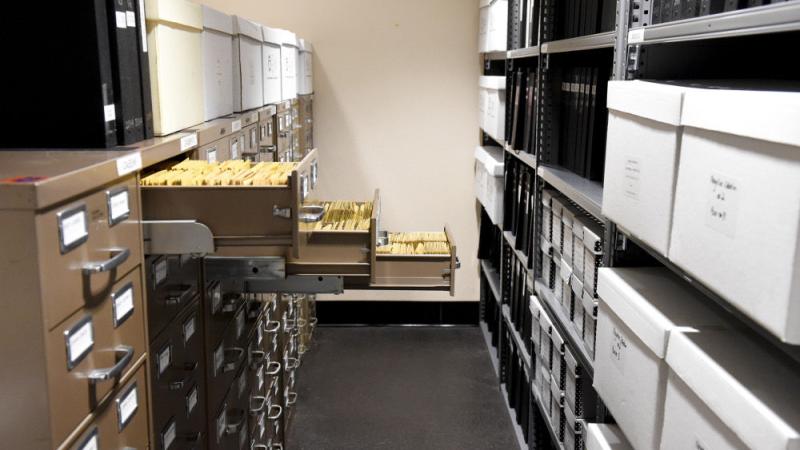 Photo of a room with filing cabinets