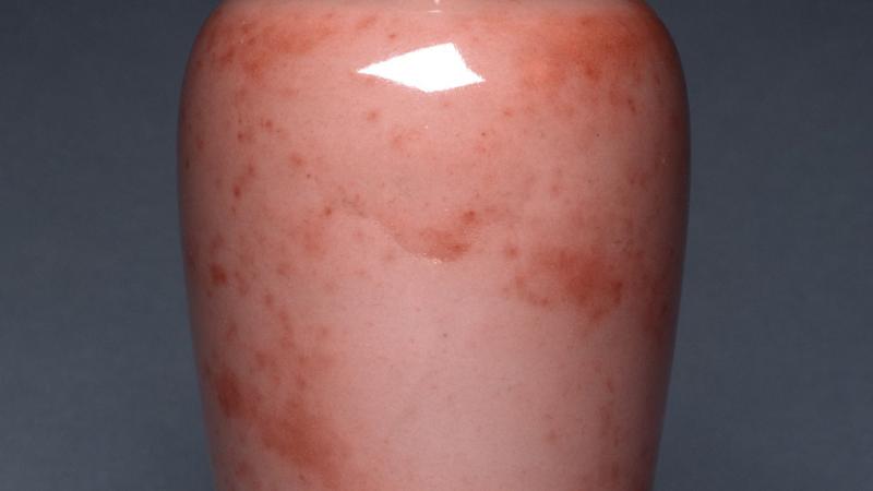 Color photo of a pink vase.