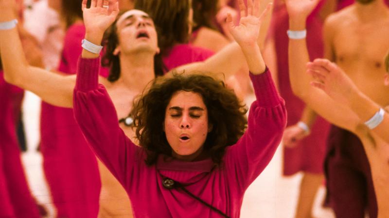 Rajneeshees, followers of Bhagwan Shree Rajneesh, participate in a Dynamic Meditation in 1982.