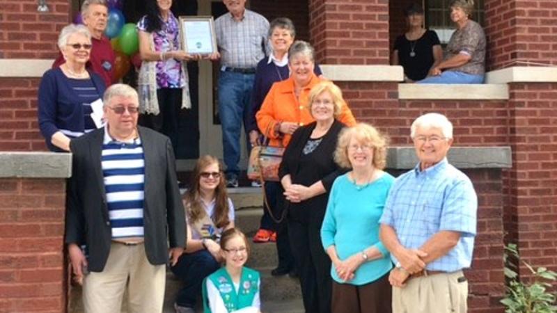 Adair County Historical Society Volunteer Staff and Board Members on front steps