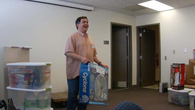 Tom Clareson, of Lyrasis, explaining how to use each item in the Disaster Supply Cache.