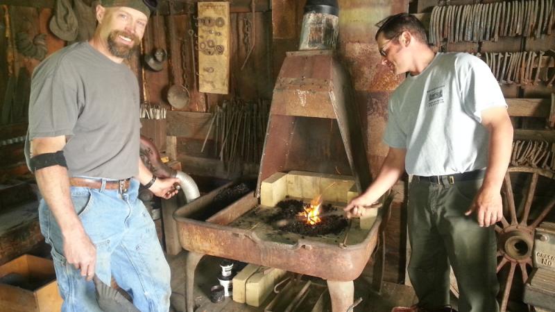 Volunteer blacksmiths fire up forge in museum's Vink Blacksmith Shop.