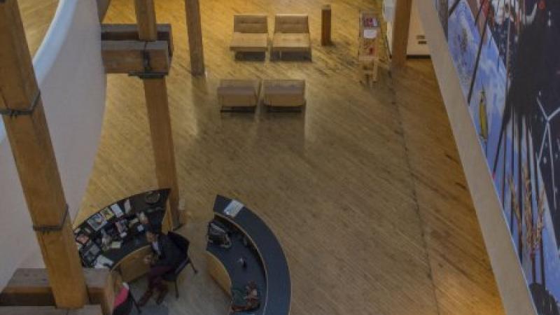 photo looking downwards at a building atrium