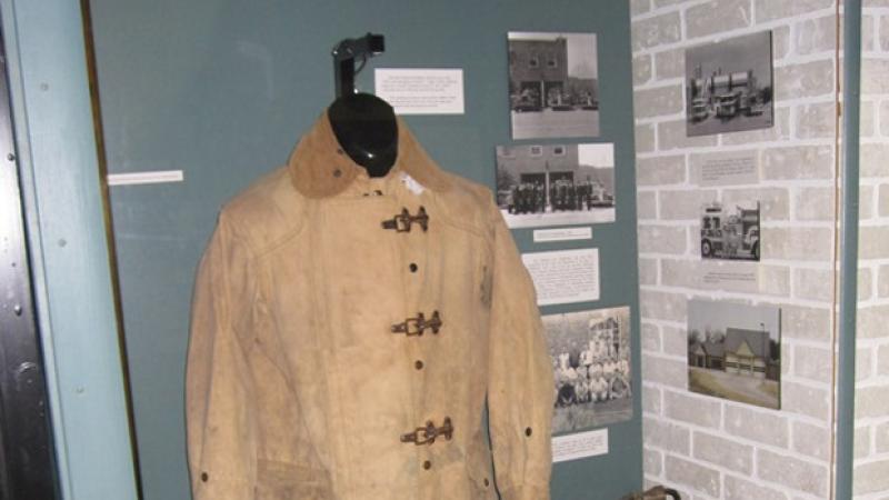 Edmond’s first fire hydrant along with an early fire suit and equipment used by