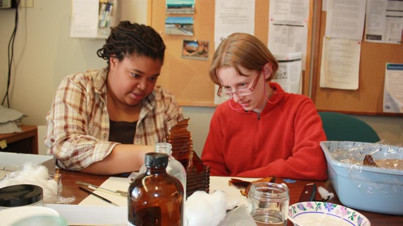 Hands on activities during a series of workshops on caring for glass and metal collection items in Williston, North Dakota.