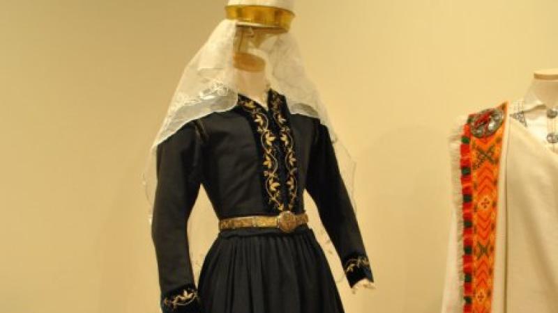 black and gold dress with veil on a mannequin