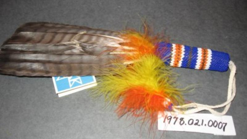 photo of a beaded feather fan