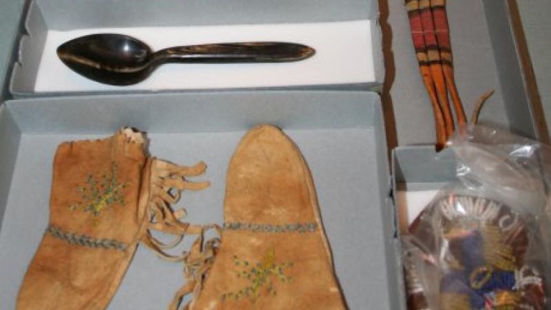 moccasins on tray, archival equipment