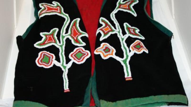 black vest with beading on it