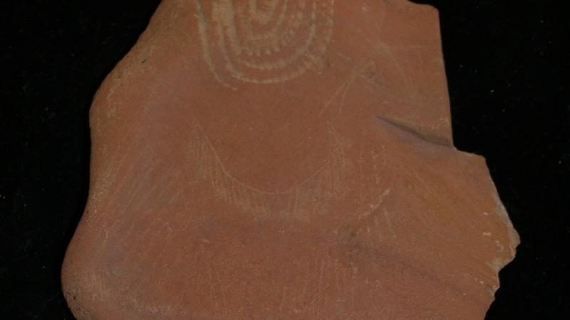 An incised stone, likely created by the Southern Paiute.