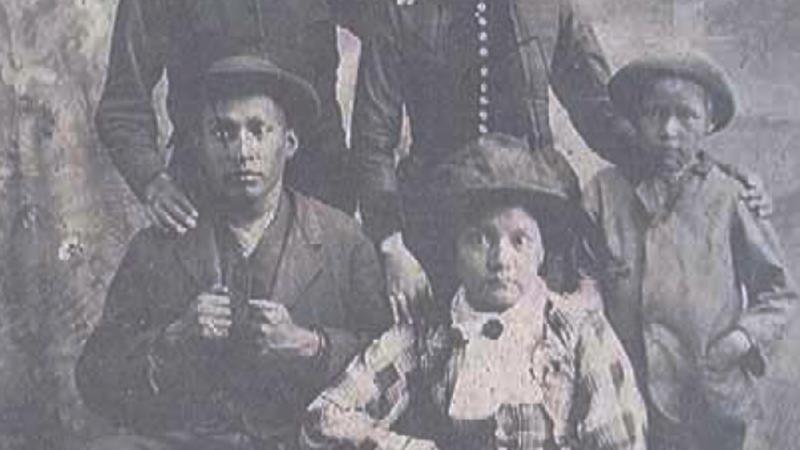 black and white photo of a Native American family