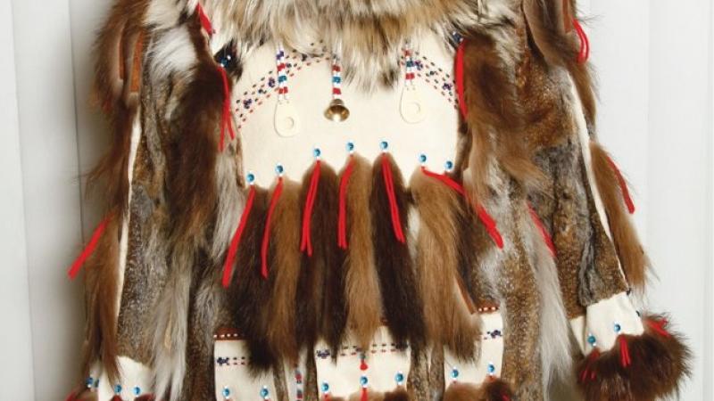 Theresa John wearing a fur parka with arrow-point designs.