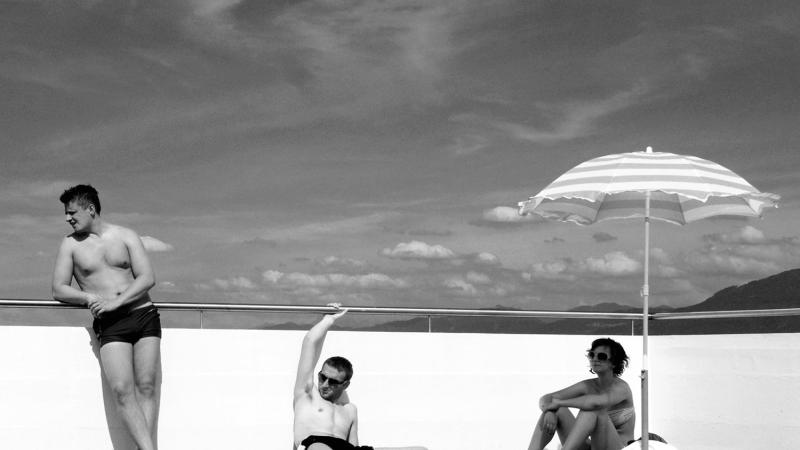 Three people at the pool