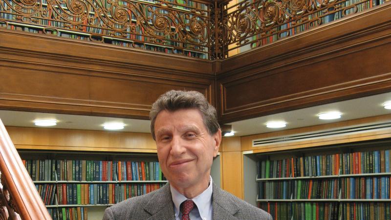 Morris Dickstein, photographed in suit and tie for Humanities magazine.