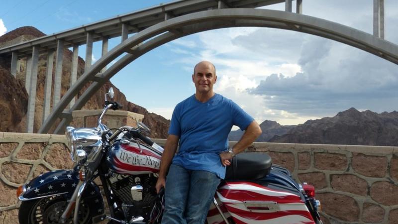 Peter Sagal with motorcycle: Constitution USA