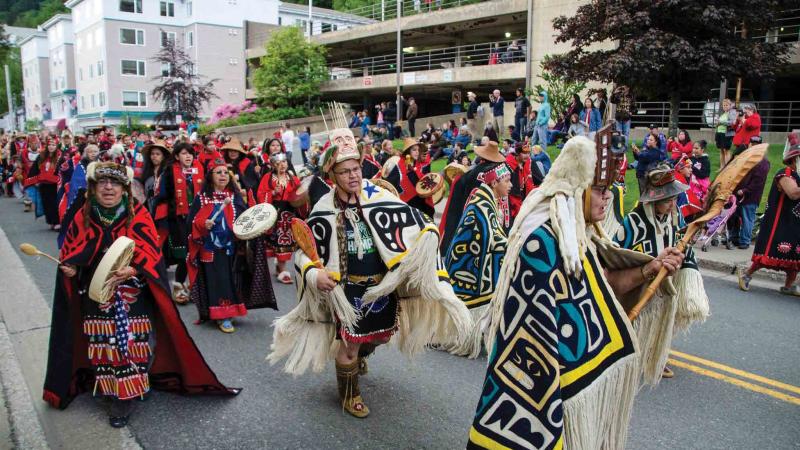 The Cape Fox Dancers in colorful traditional gard and headwear at the Sealaska Heritage Institute Celebration in 2014. 