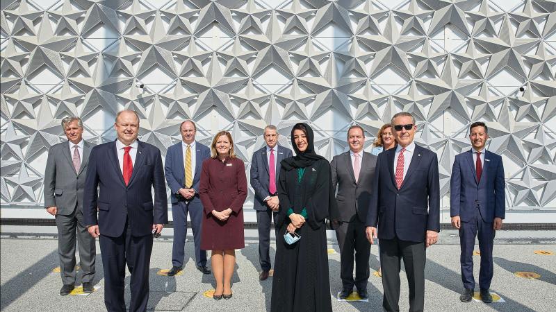 Group of dignitaries on the exterior of the American pavilion at Dubai Expo