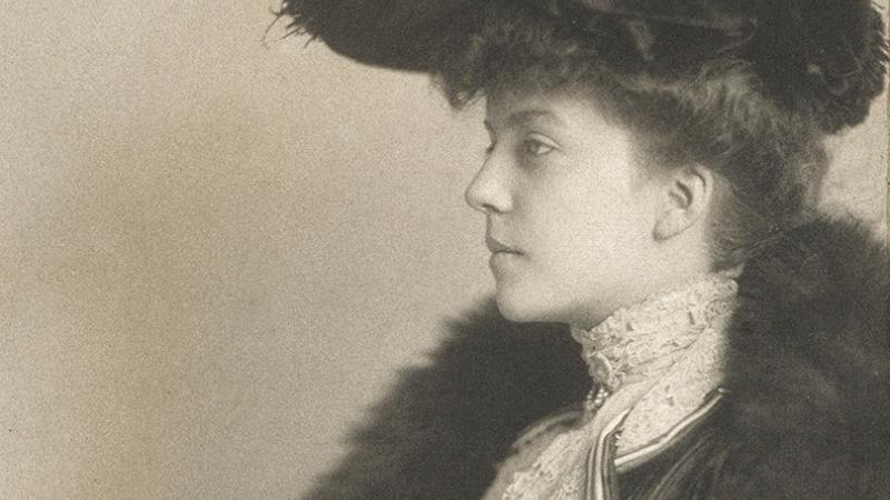 black and white photograph of Alice Roosevelt Longworth with big fur hat
