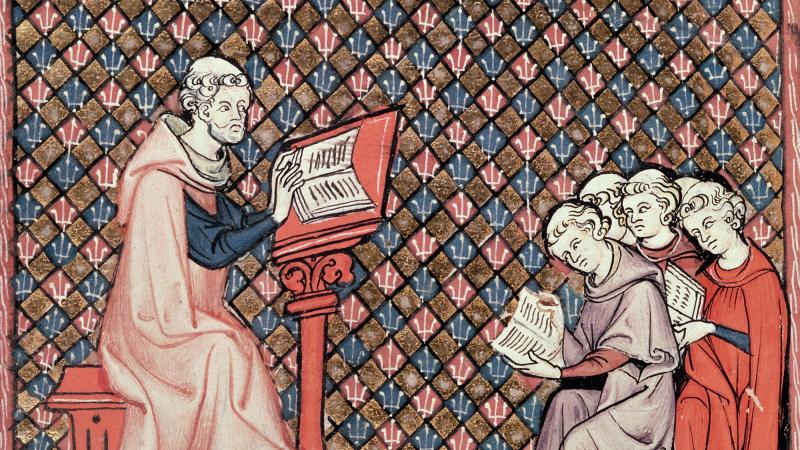 a medieval monk teaches his students