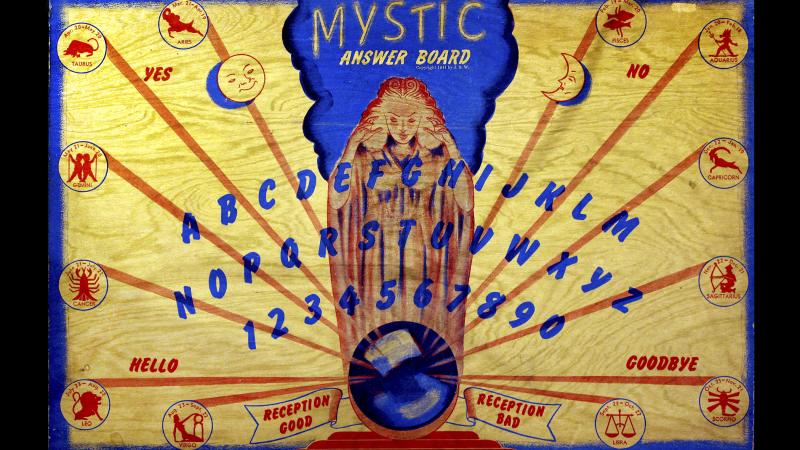 a mystic answer board with gold, blue and red lines