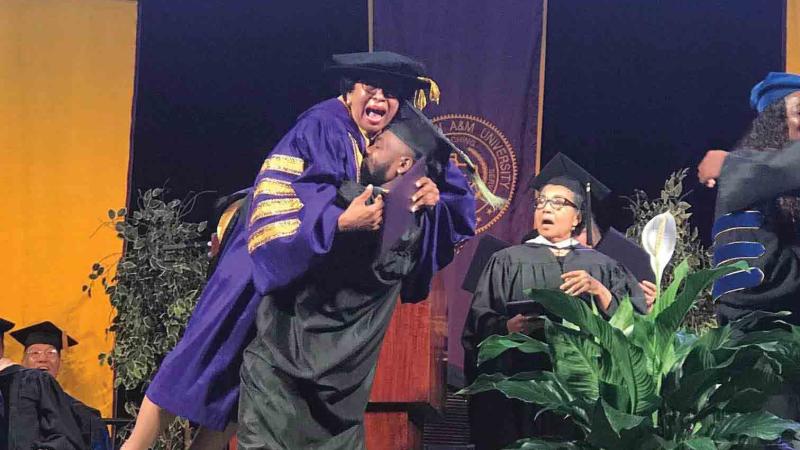 A graduation hug from an appreciative student