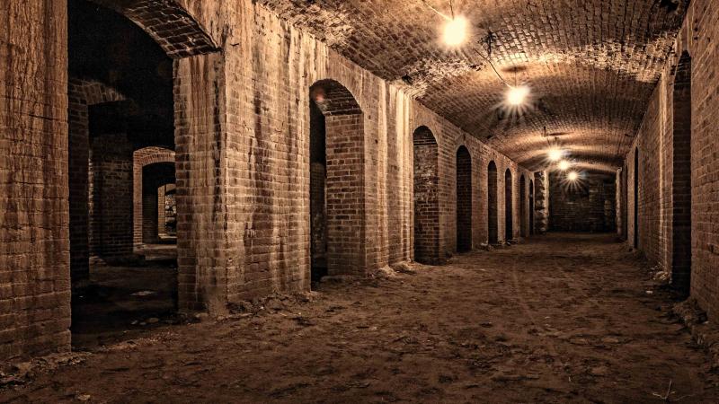 photograph of the dimly lit catacombs underneath Indianapolis